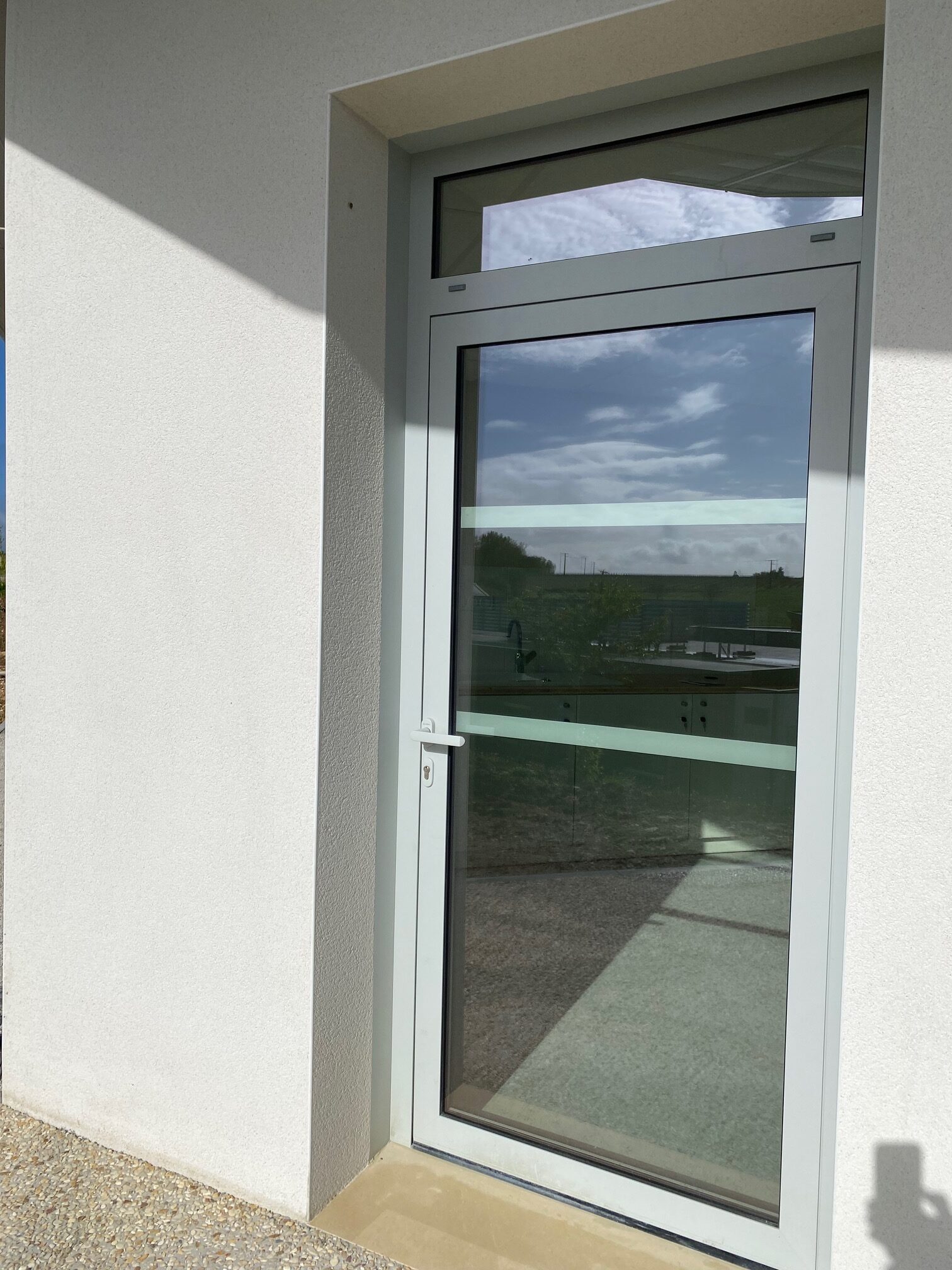 Porte alu imposte vitré toute hauteur