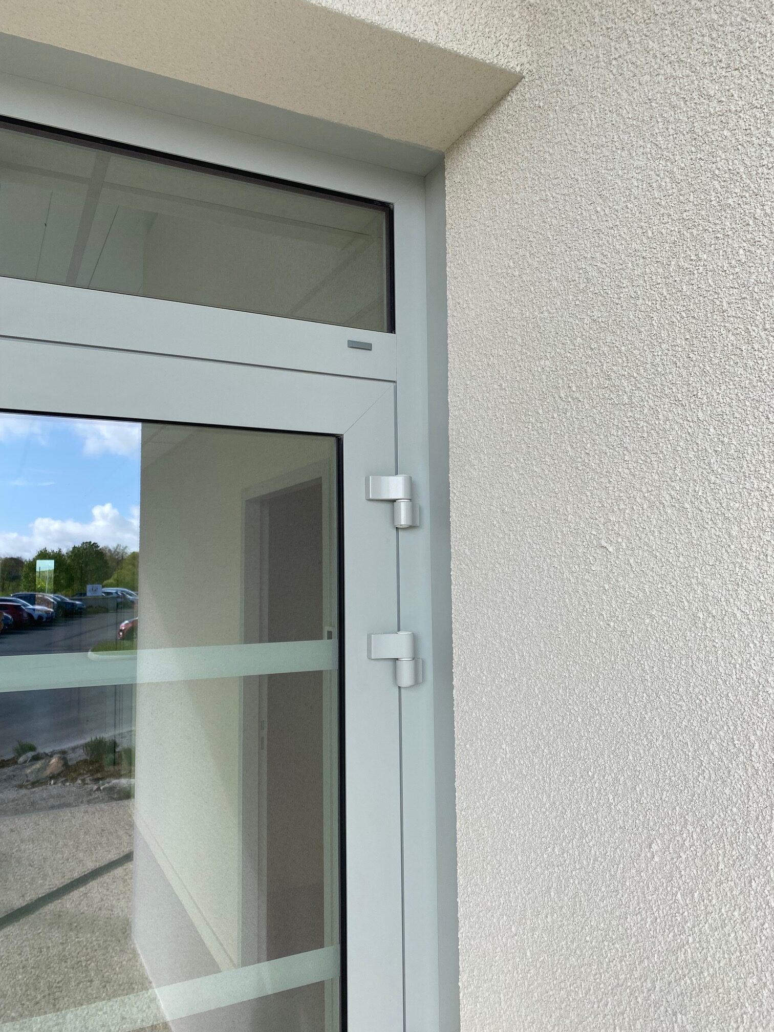 Détail porte vitrée alu